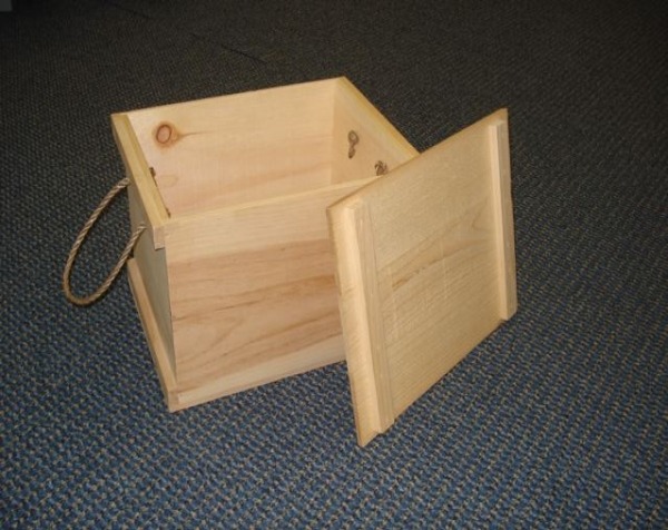 Large custom wooden chest with rope handles and drop-in top, available in bulk for storage, product packaging, and retail display. Shown with the top removed.